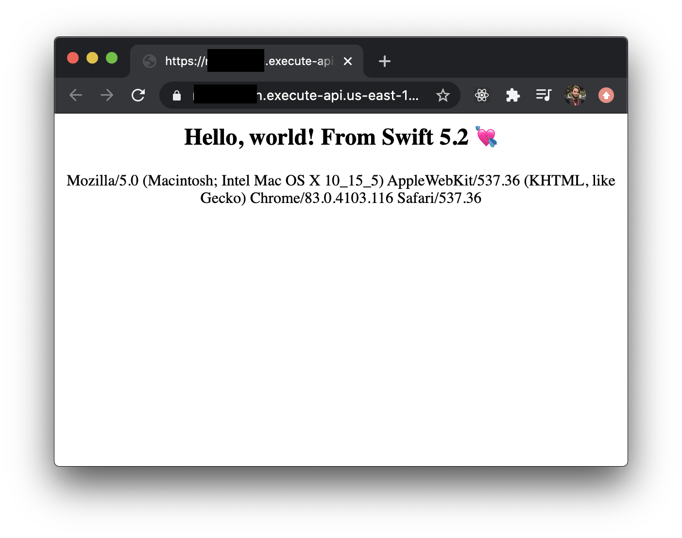 Image shows a browser on an AWS Lambda URL showing the words "Hello, world! From Swift 5.2 💘 and a User Agent string" output from the swift code